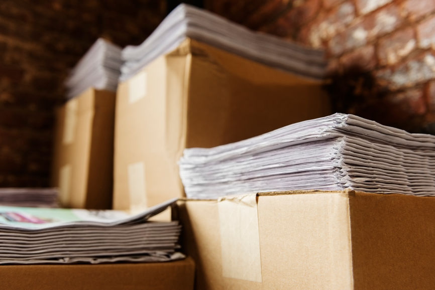 Stacks of paper in boxes